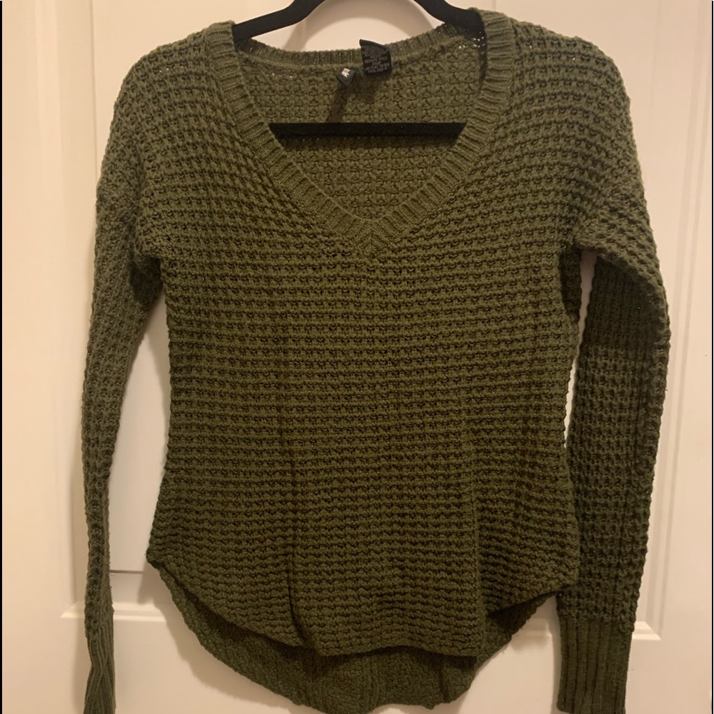 Dark green knitted sweater with v-neck